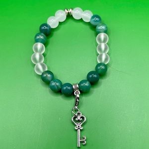 COPY - Beaded bracelet w center silver spacer w attachment for change charm 3/5…